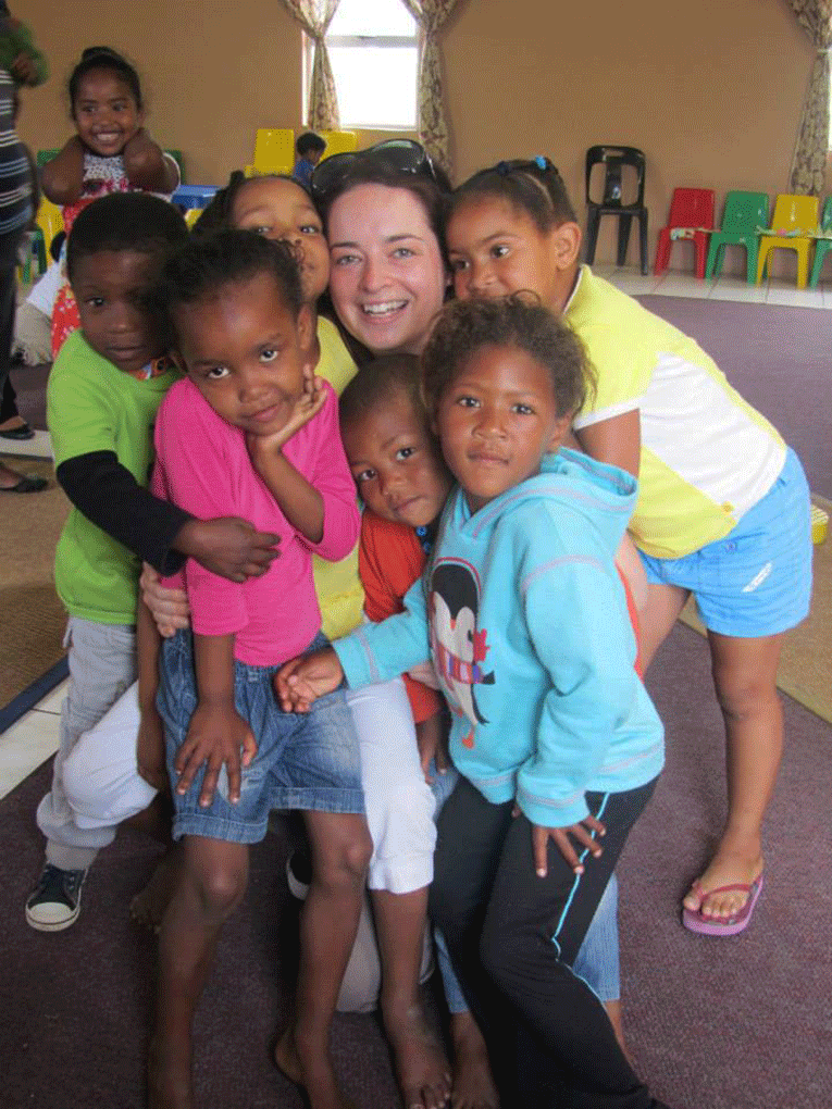 Volunteer with children in South Africa