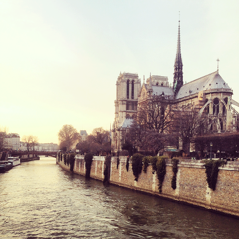 Church along a river in Paris, France