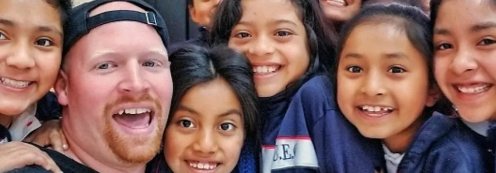 a TEFL teacher with his students