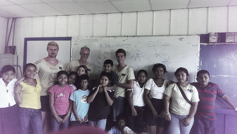 Volunteer teachers in Granada, Nicaragua with their students