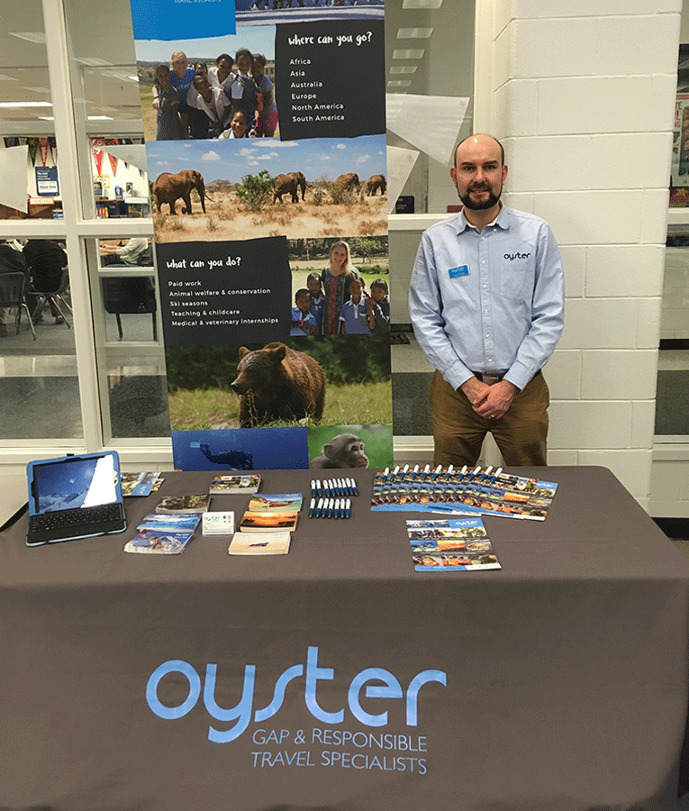 Jon ready to meet students and parents at a gap fair in the USA