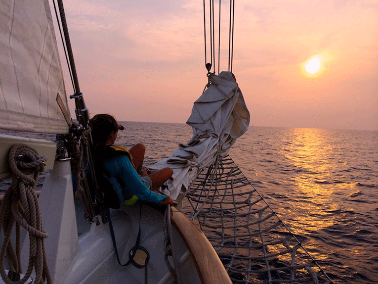 Sunset at the bow of a ship