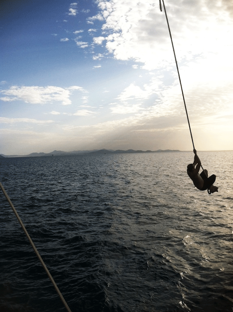 Rope swing over the ocean