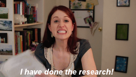 Gif of woman holding paper saying I have done the research
