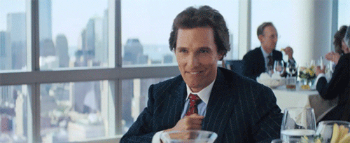 Matthew McConaughey in a business suit gif