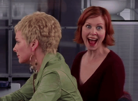 women happy to see each other in the break room gif