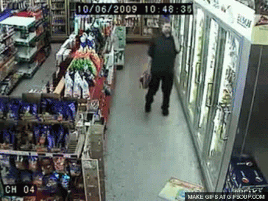 Intoxicated person carrying beer and falling in store