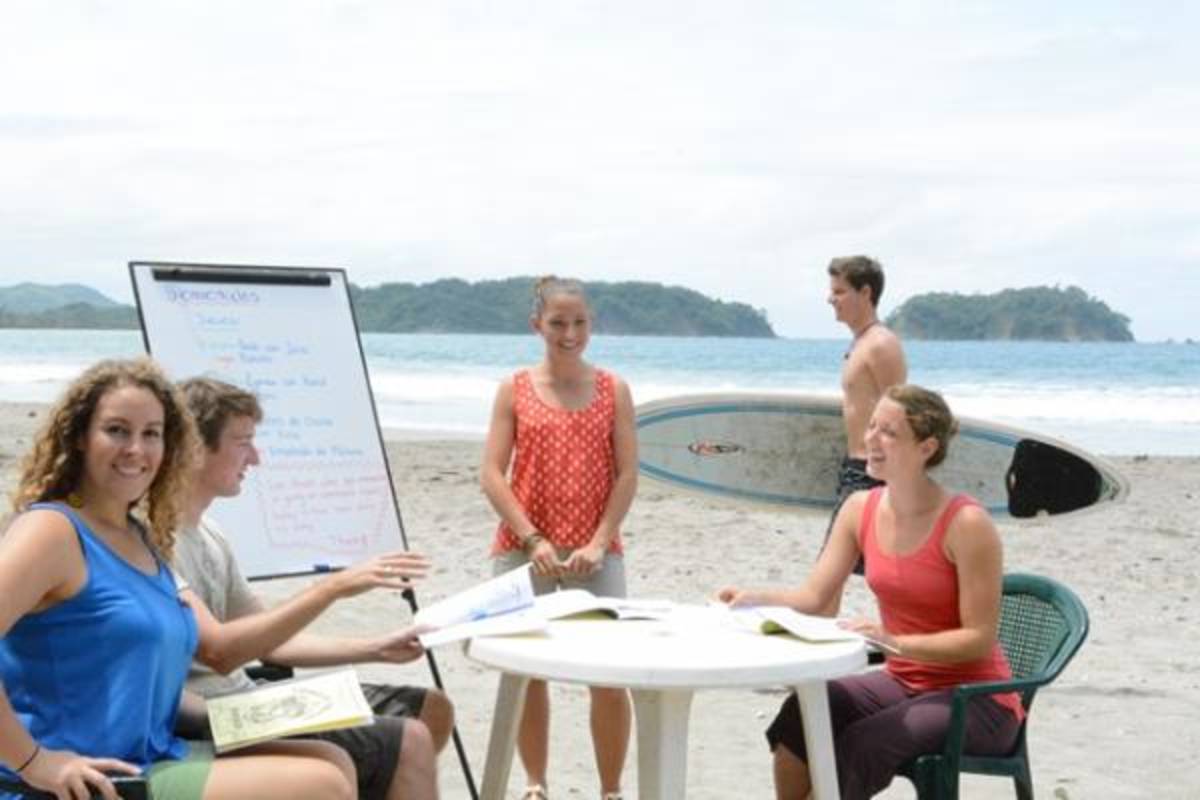 spanish and surf in samara beach, costa rica