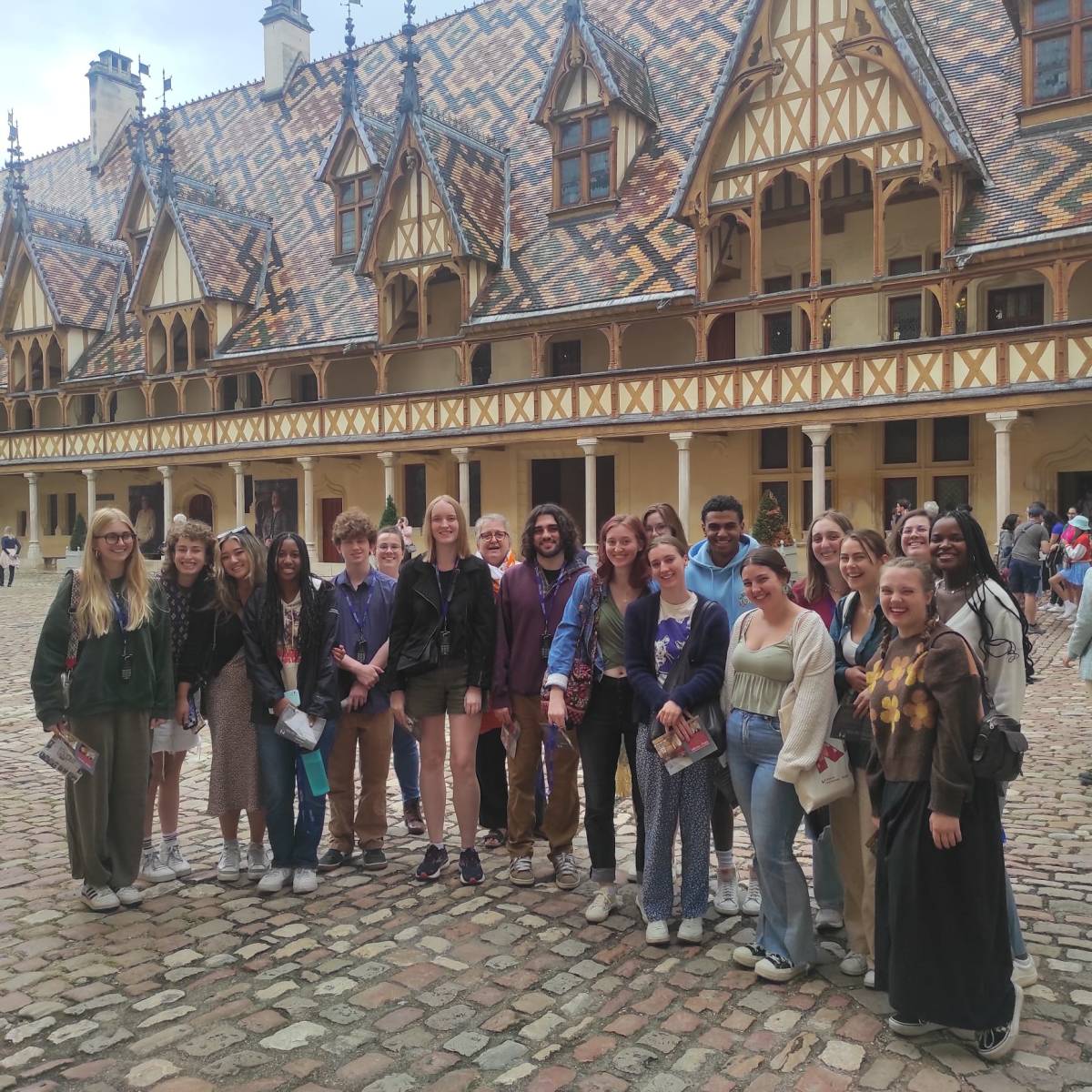 A group of students in front of the Beaune Hospice Museum in France.