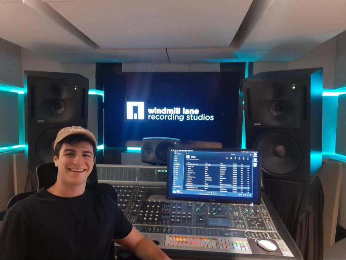 A student sits in a recording studio during his internship in Dublin.