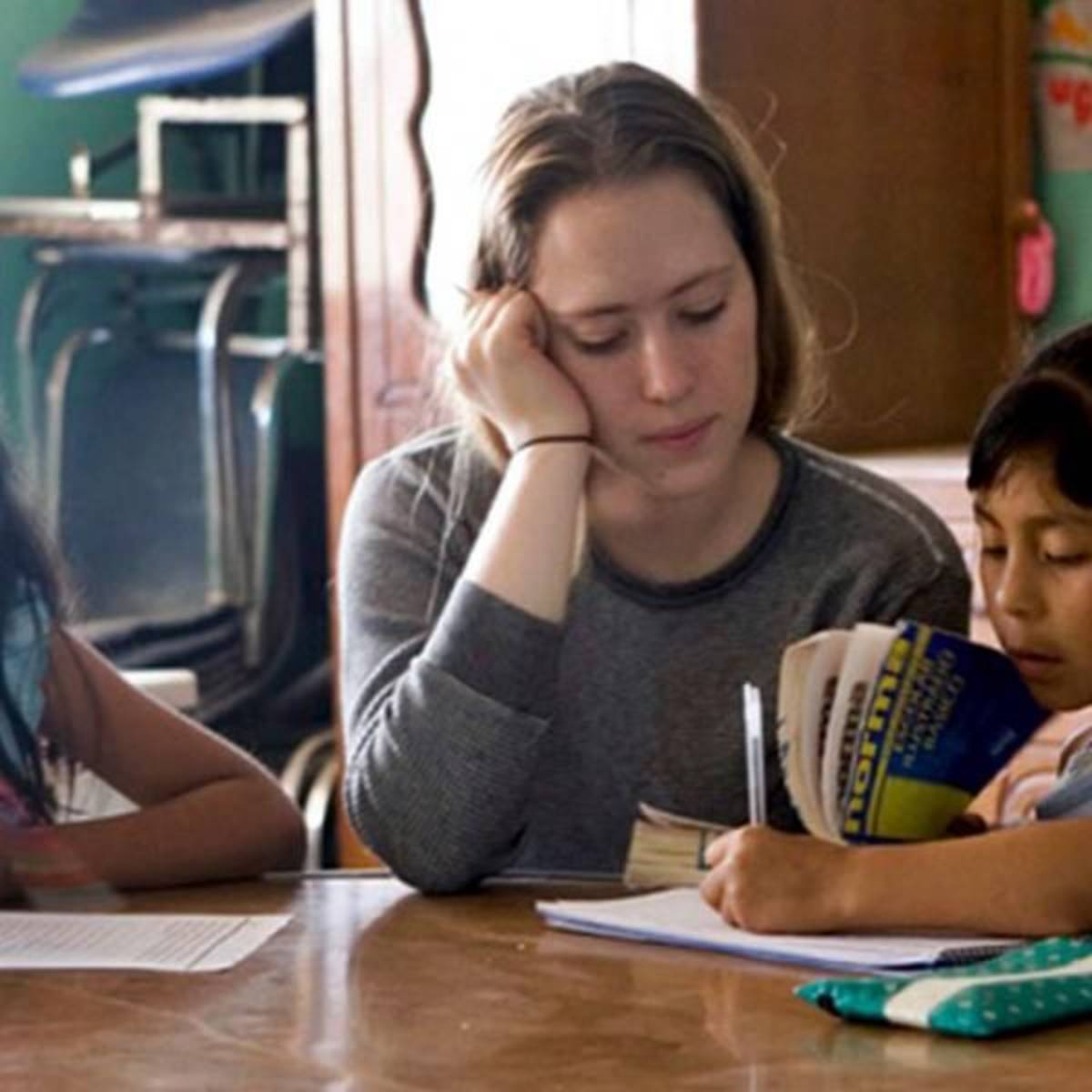 Volunteer helps with homework