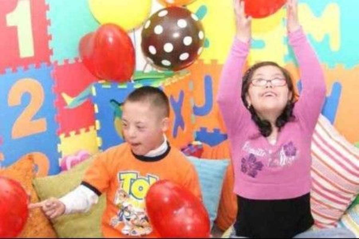 Children playing with balloons