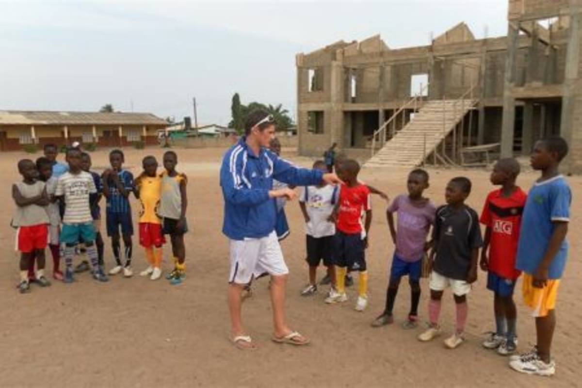 Volunteer coaching football team