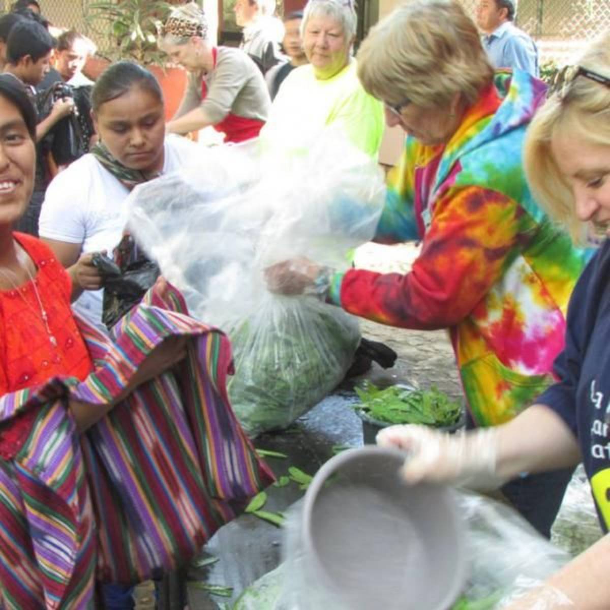 Volunteers and local women working together