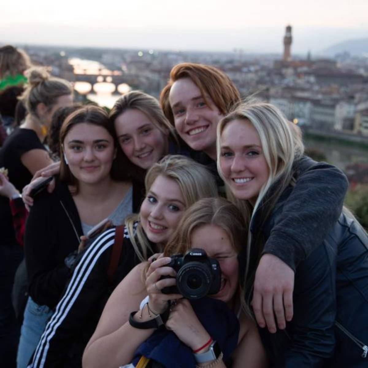 students enjoying the sunset.