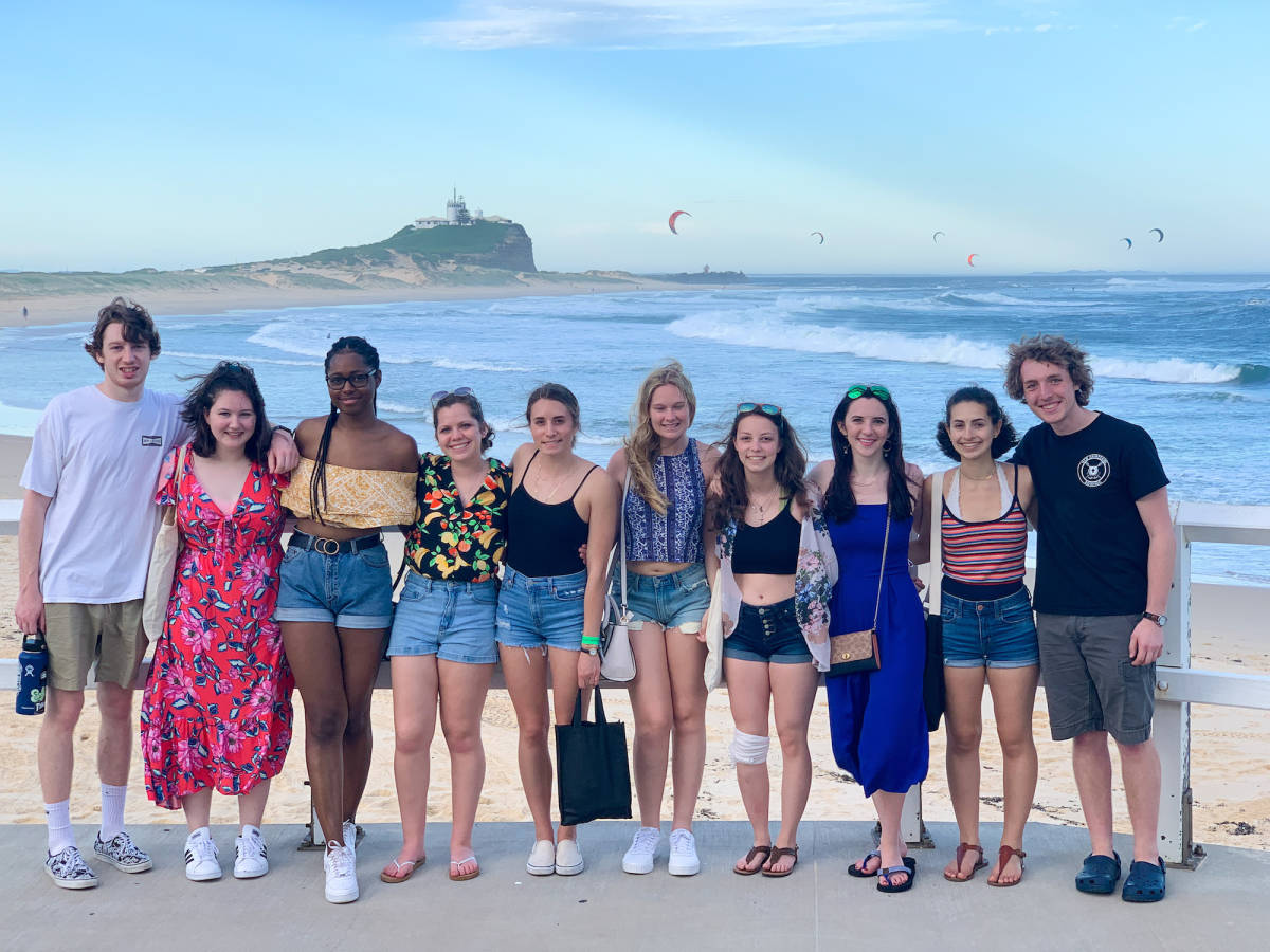 Friends posing at the beach.
