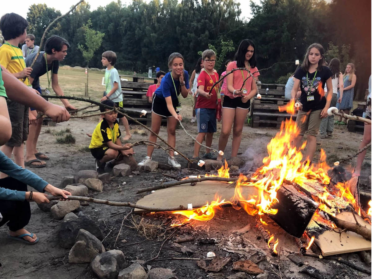 Gather around the camp fire by night
