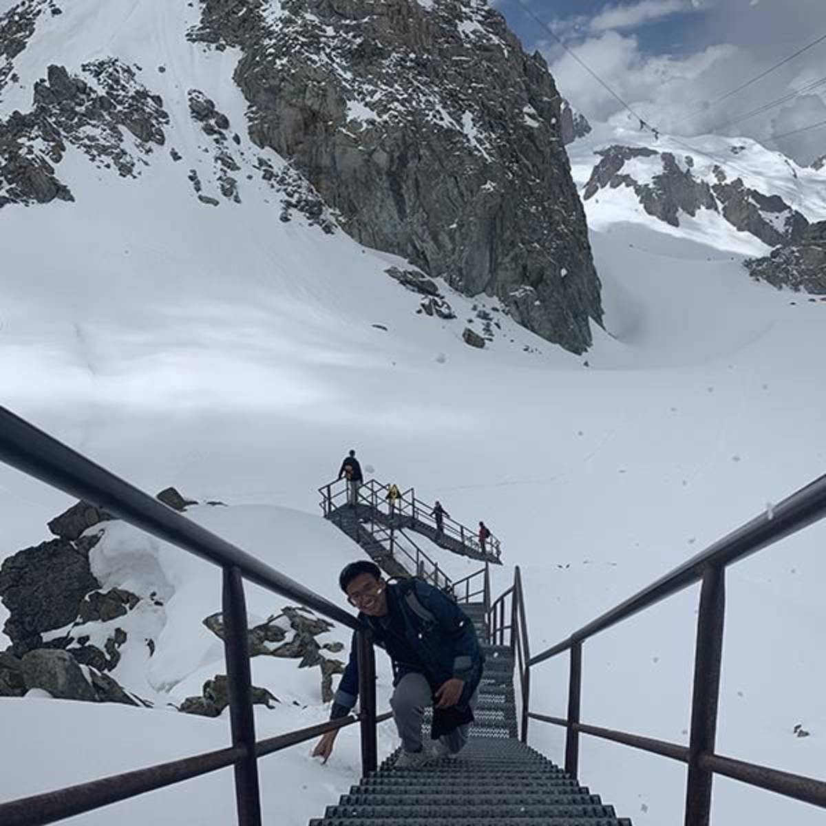 Students Climbing up the Alp Mountains