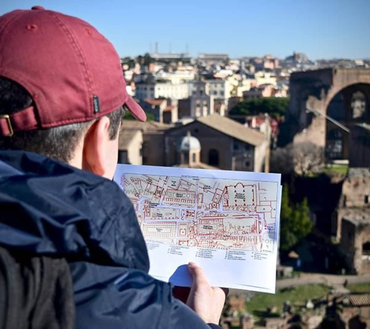 Student Looking at a Map in Rome