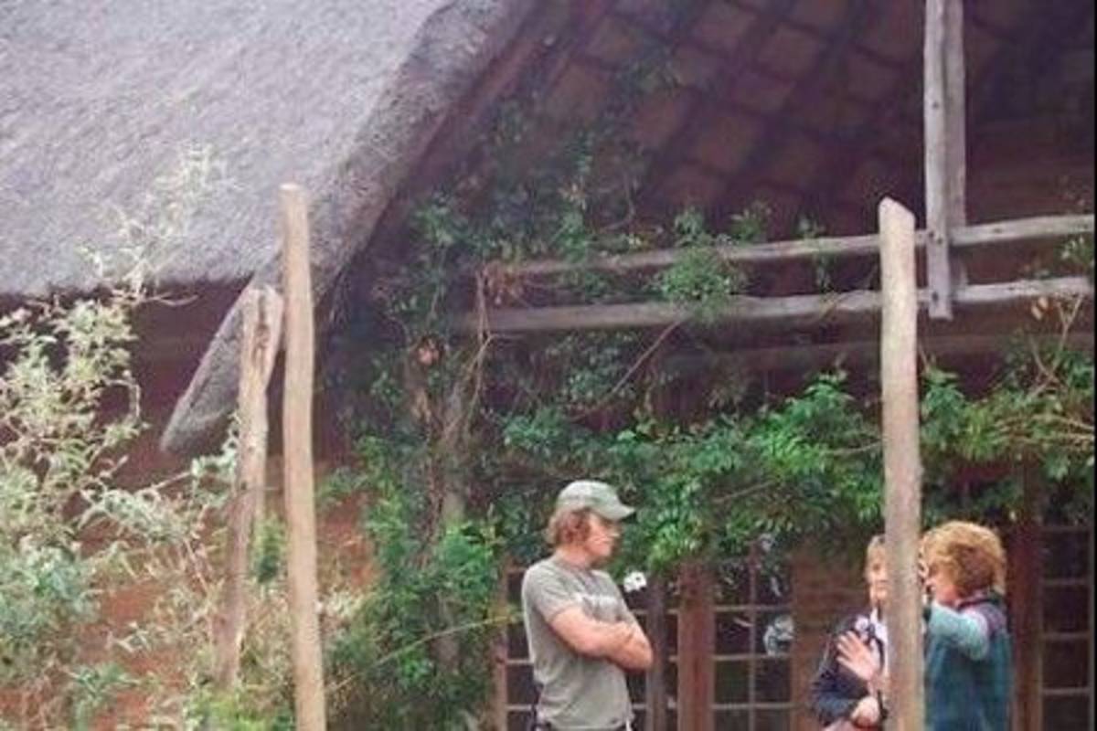 Volunteers outside Victoria Falls Lion Rehabilitation in Zimbabwe