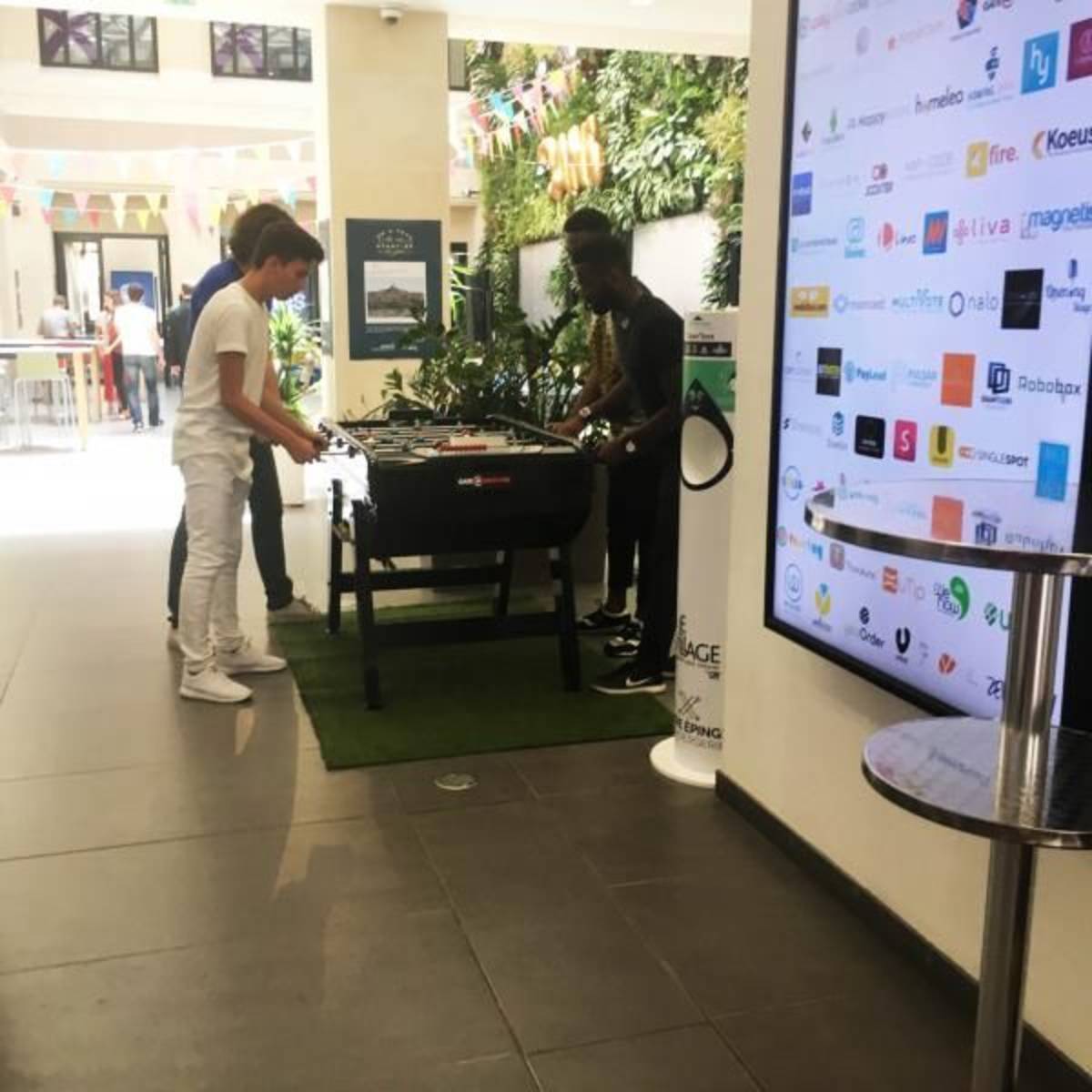 Paris Interns in break area at startup incubator