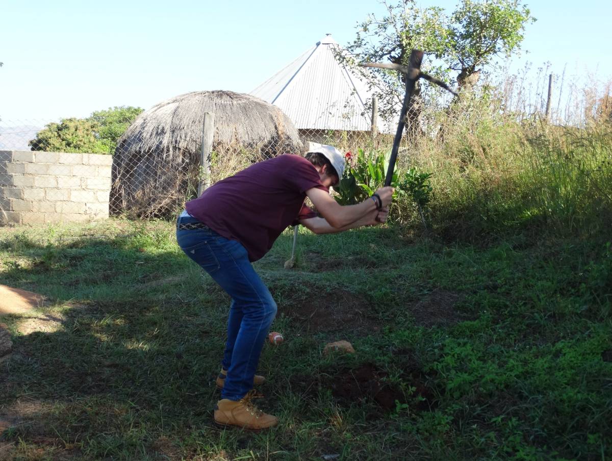Volunteer in action on building project