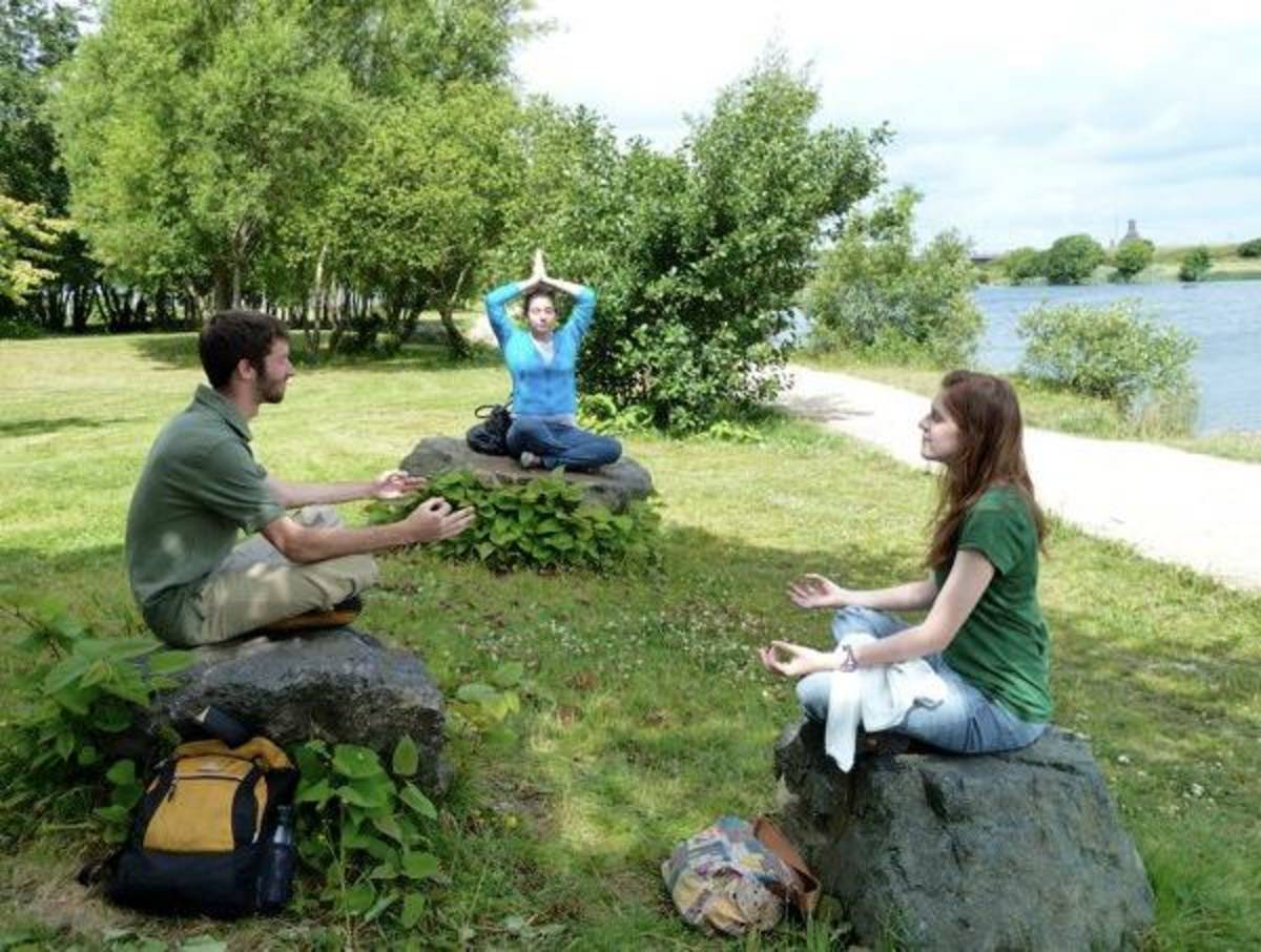 Students practicing meditation on Campus