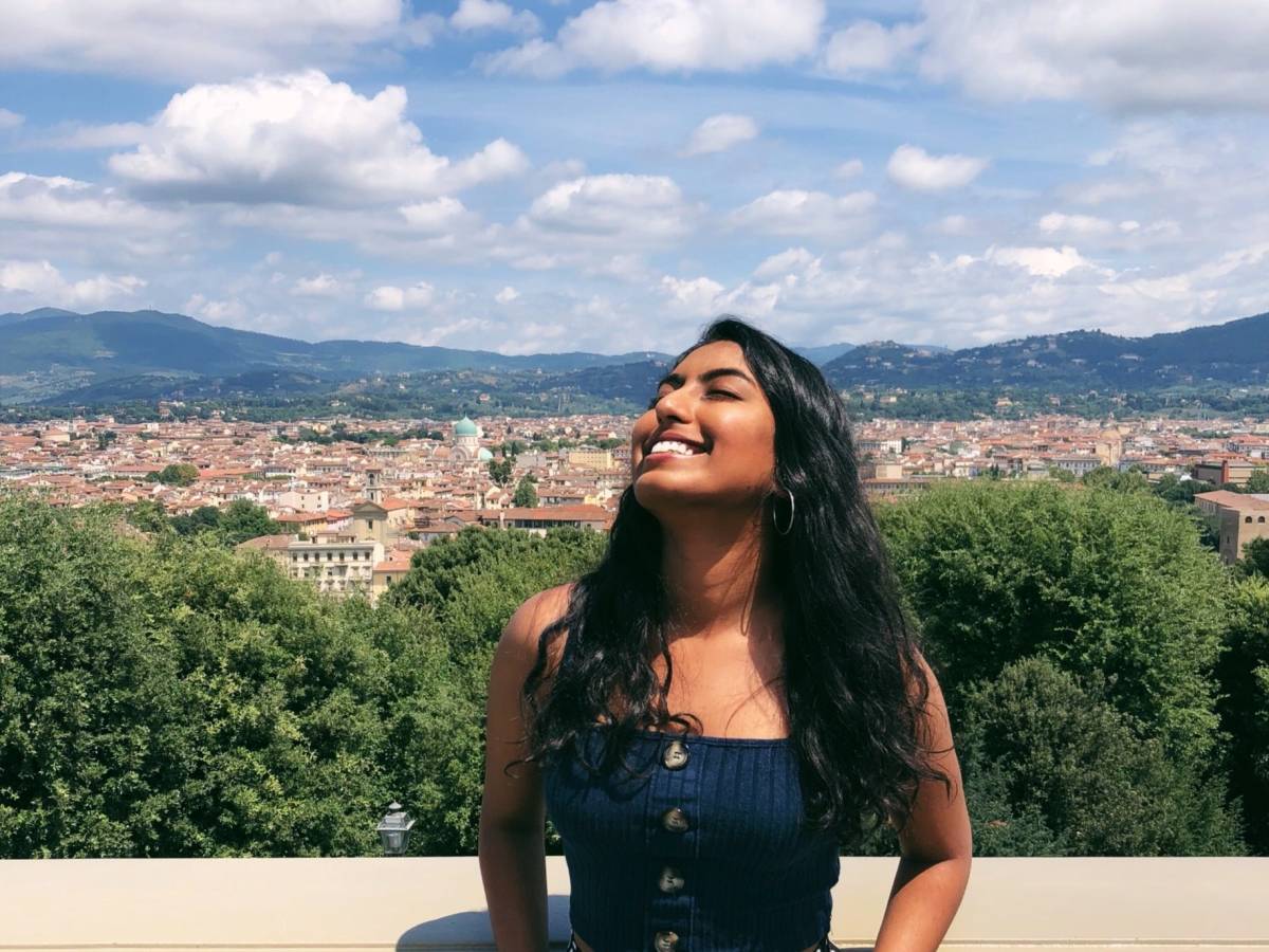 One of our interns basking in the sun in Scotland!