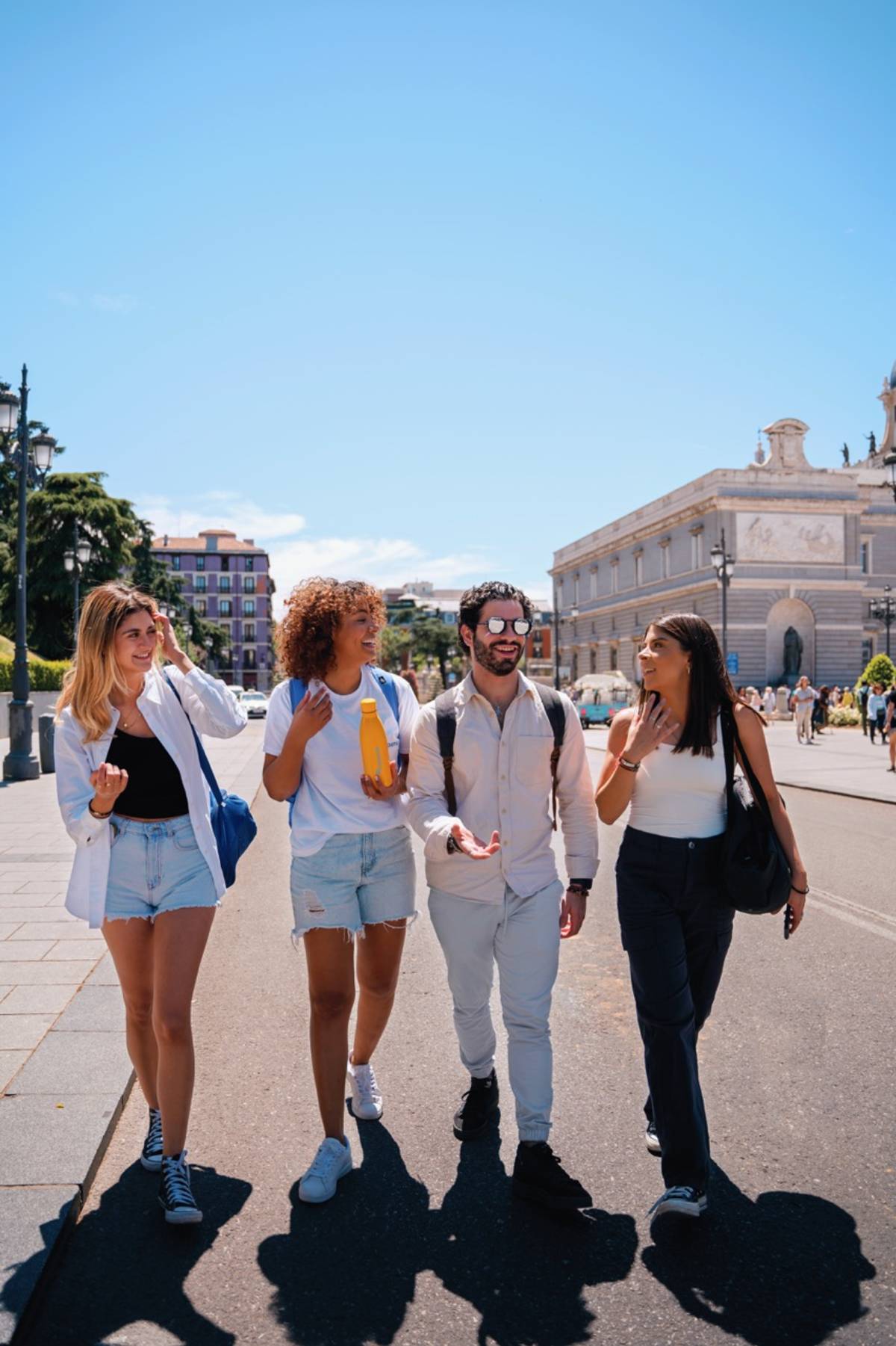 people walking on the street while talking