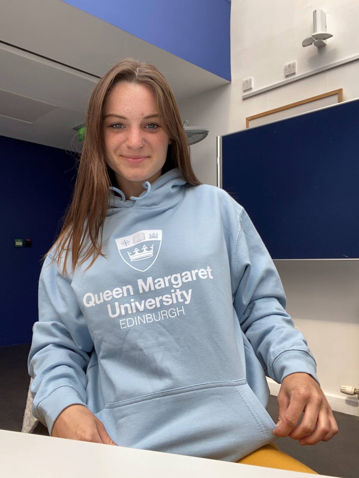 psychology student with edinburgh sweater