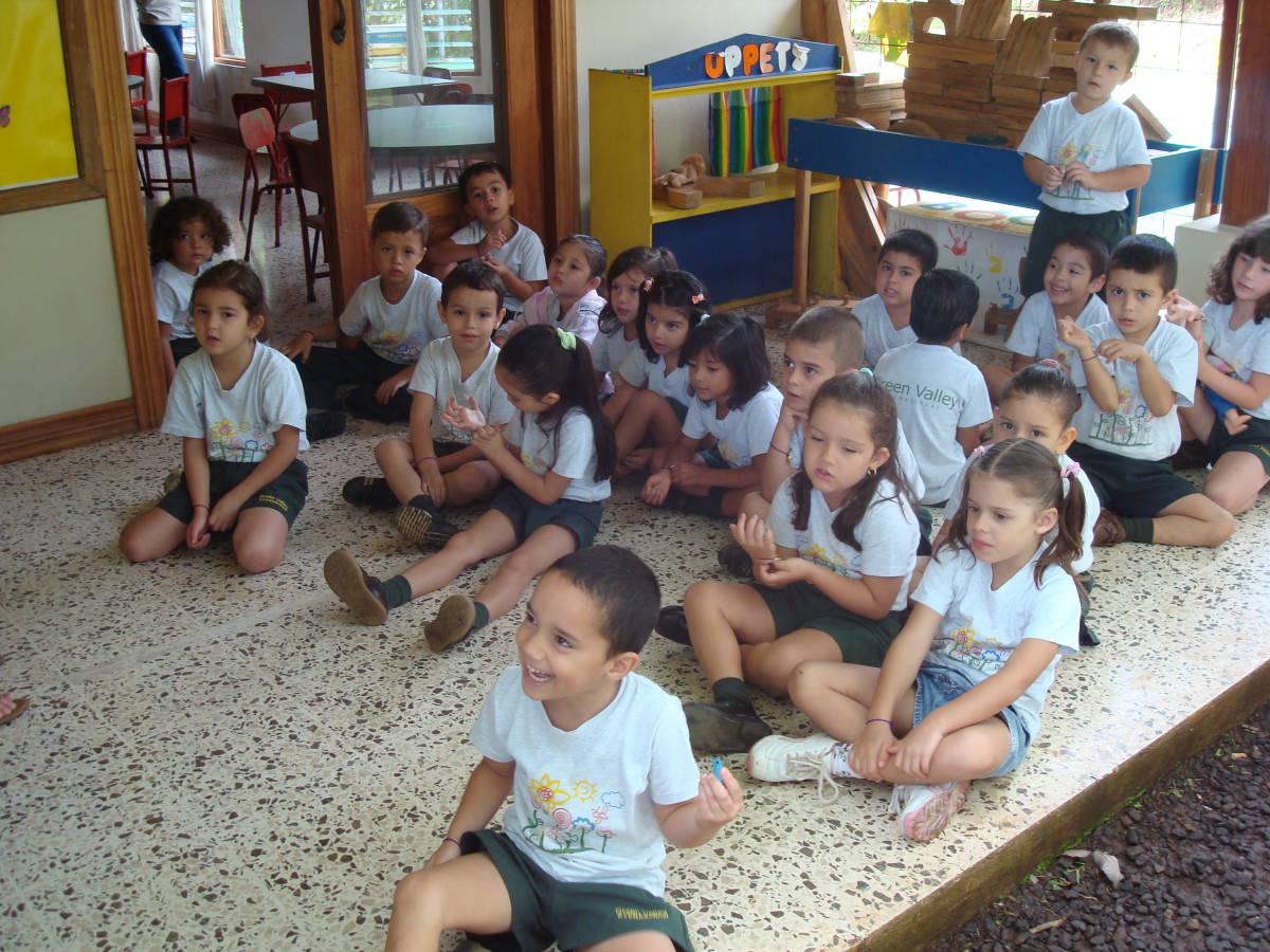 pupils sitting on the ground