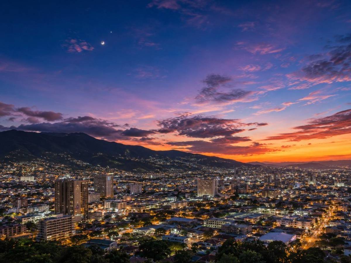 San Jose skyline illuminated beneath a colourful sunset