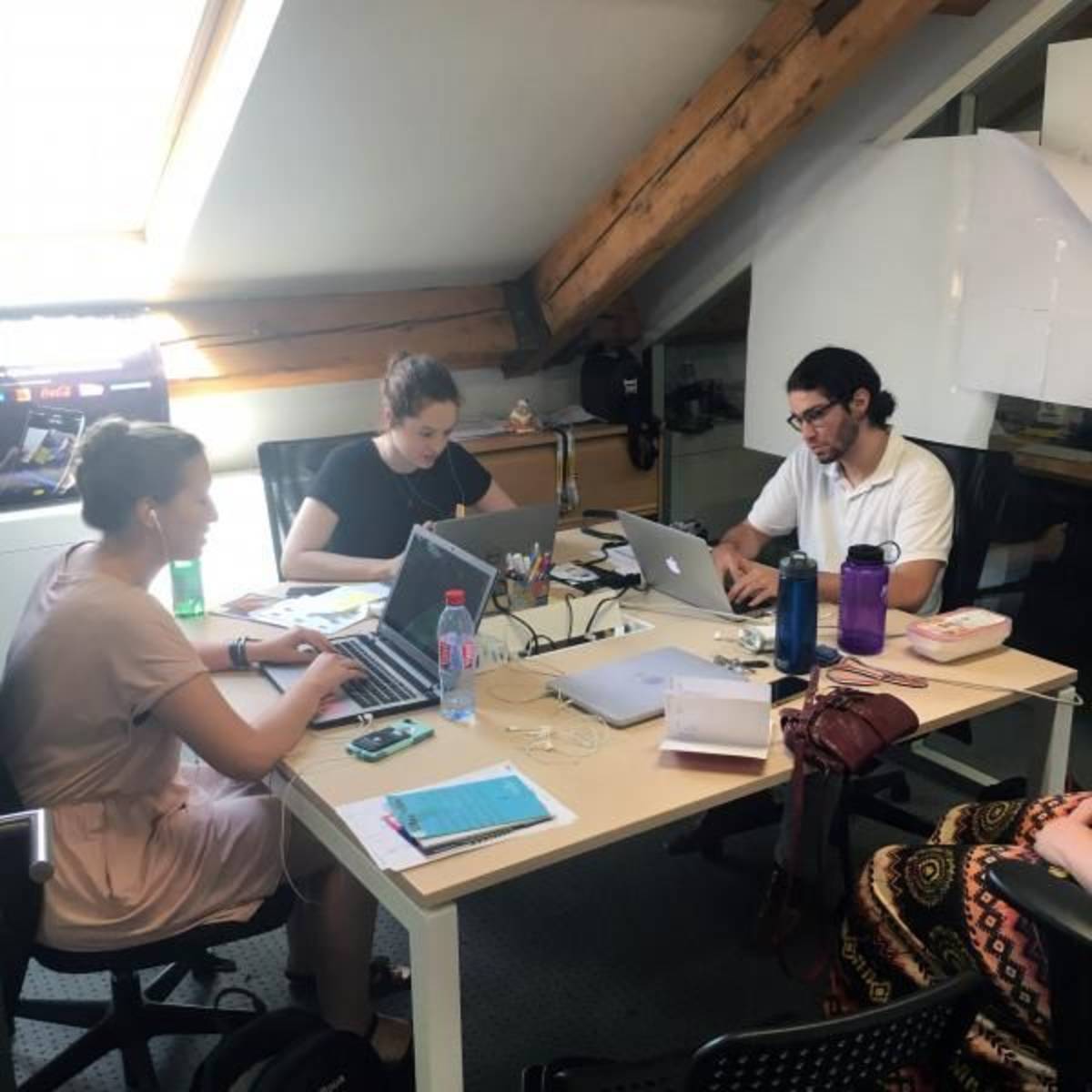 Paris Interns at their desks