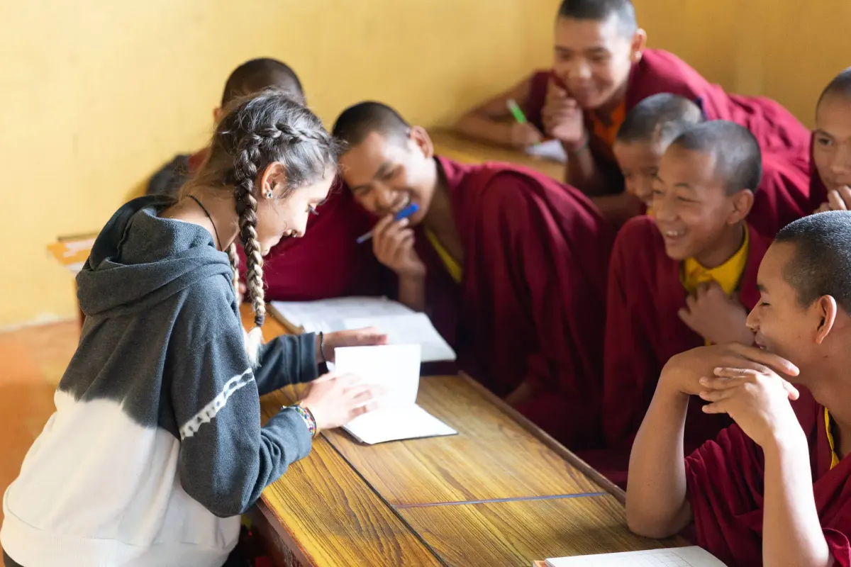 Student interacts with local kids at monetary