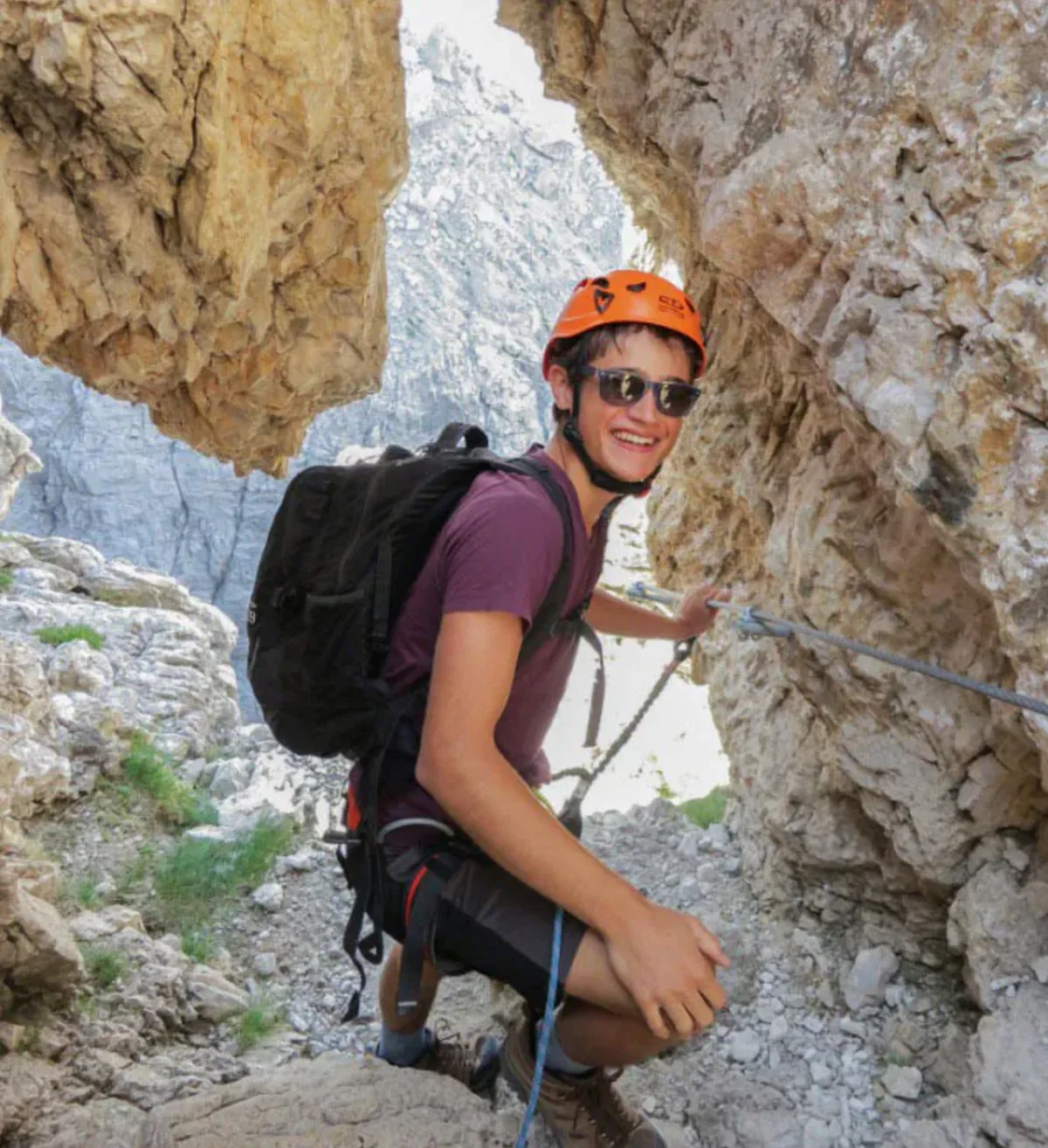 Student rock climbing in the alps