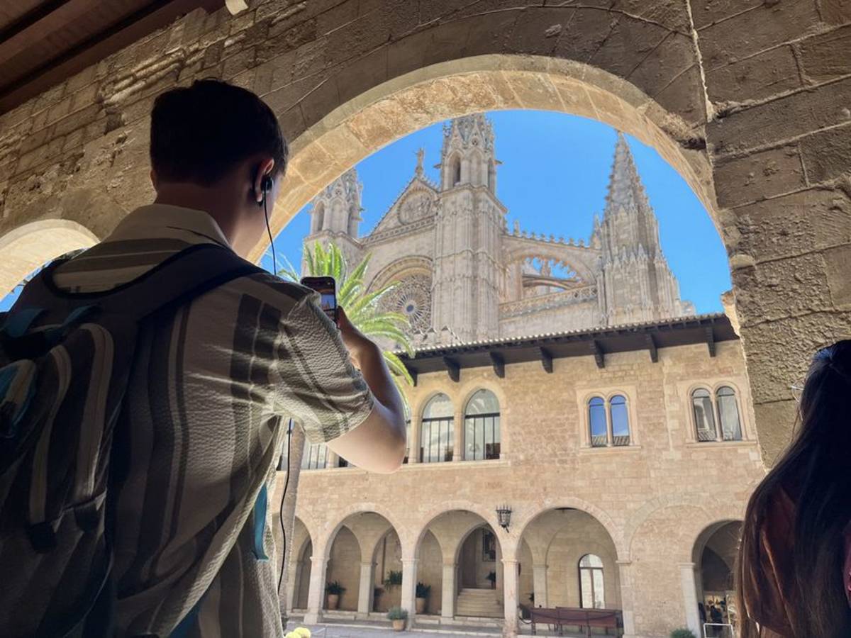 Student taking a picture of a cathedral in Palma de Mallorca