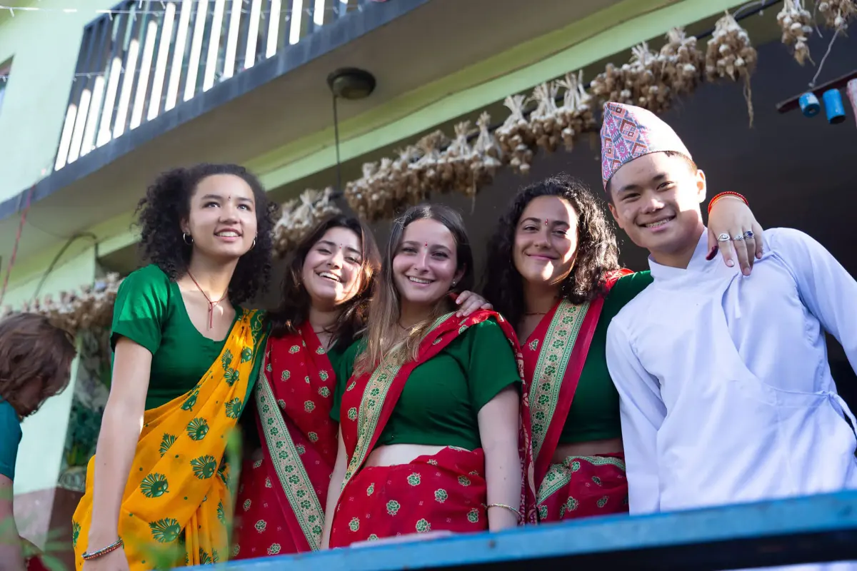 Student wear traditional local garbs