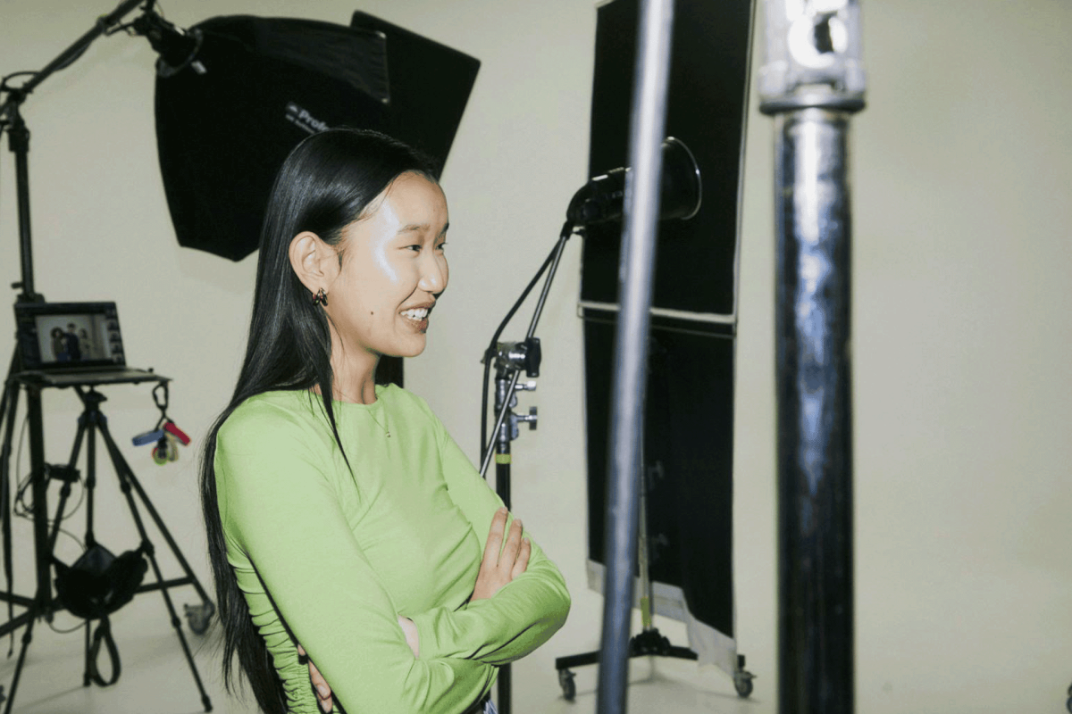 Student working on a photo shoot in a studio