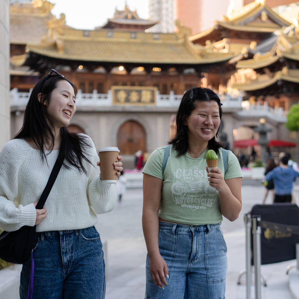 Students eat ice cream outside.
