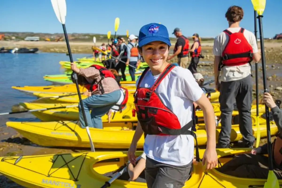 Students get in Kayaks