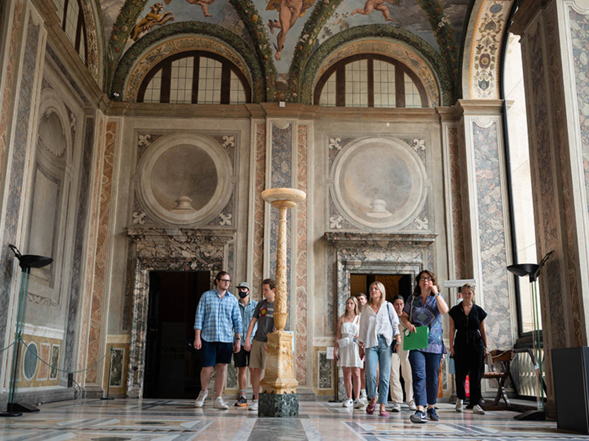 Students having an on-site class in a museum