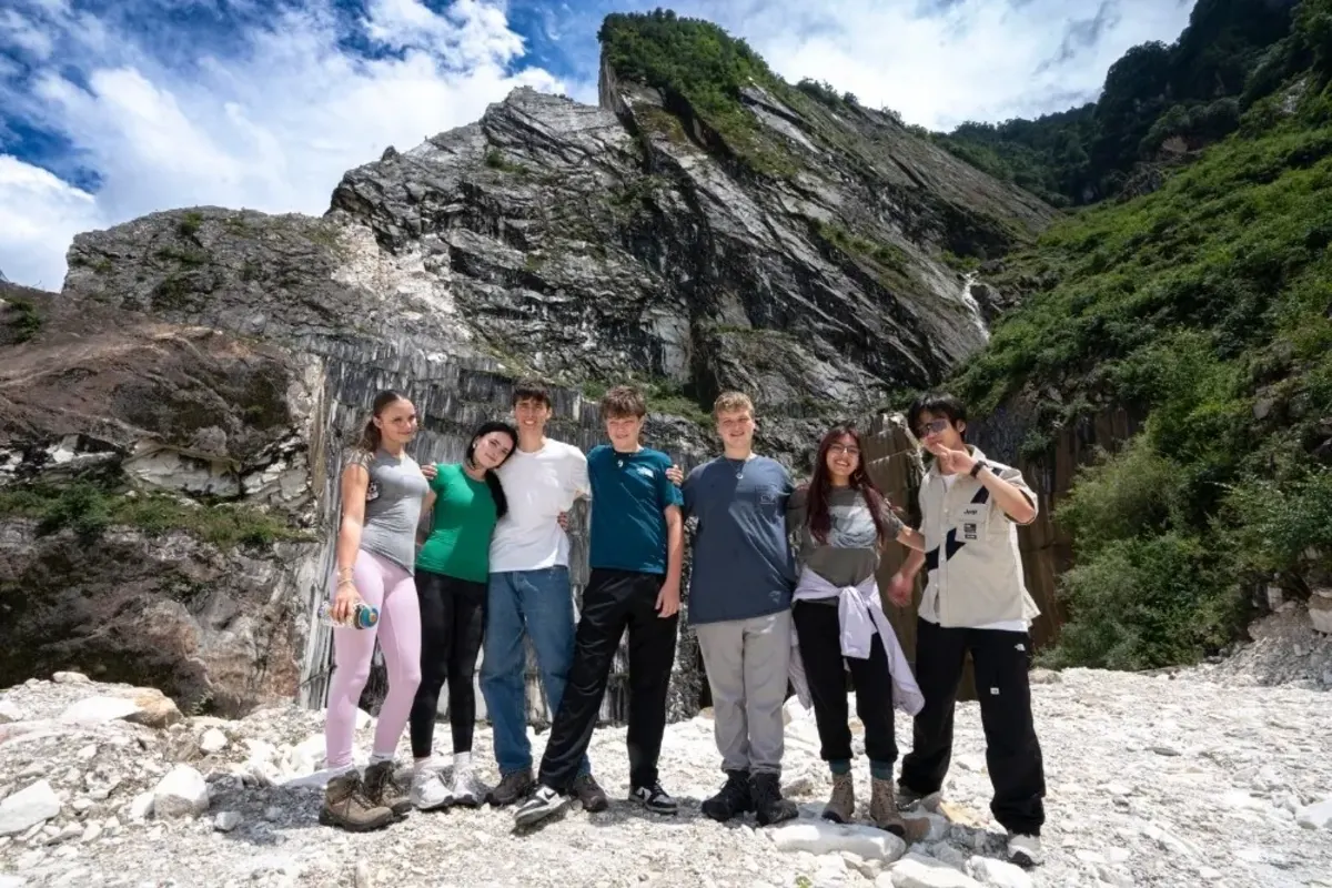 Students hike rural mountain in China