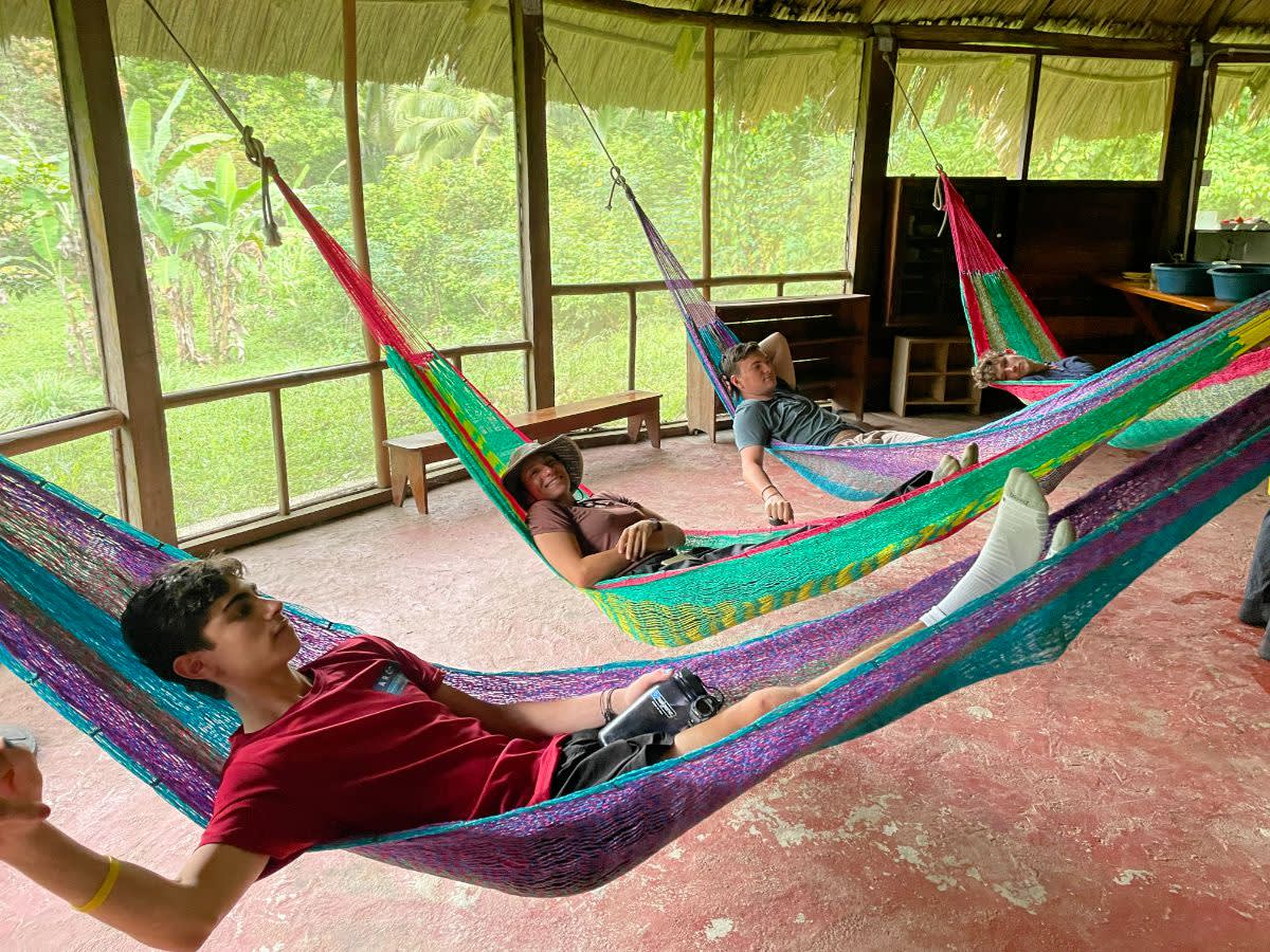 Students in Hammocks in Jungle