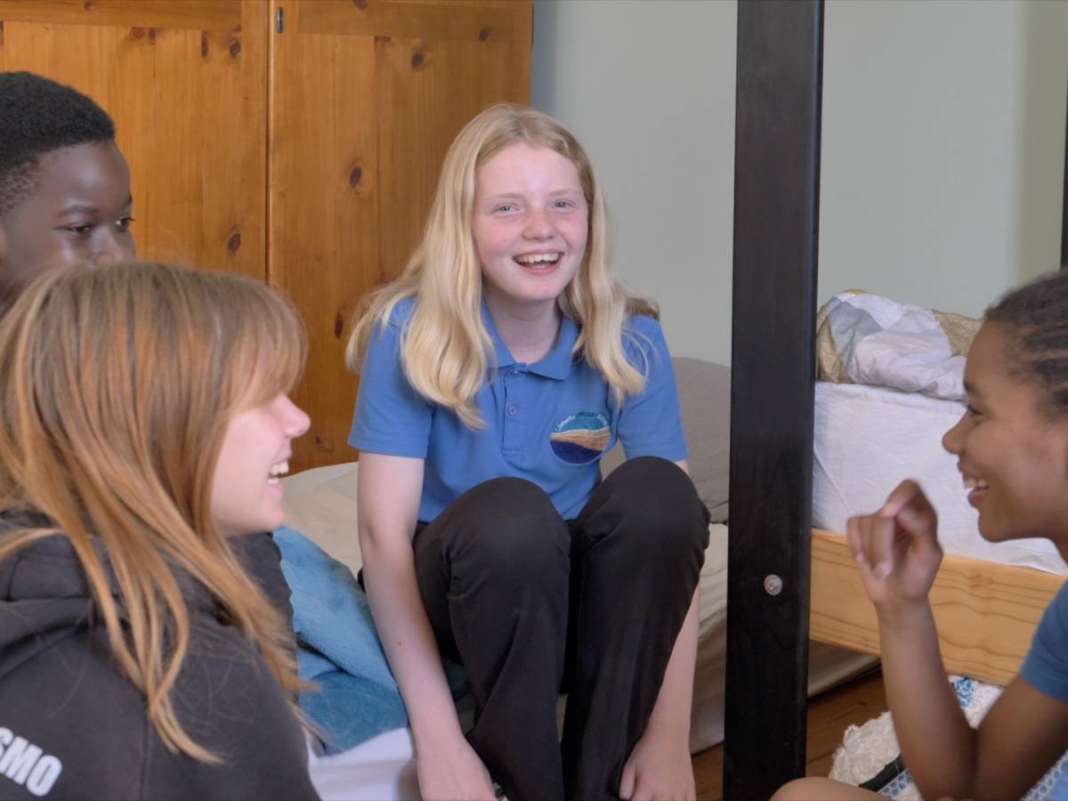 Students laughing in our boarding house