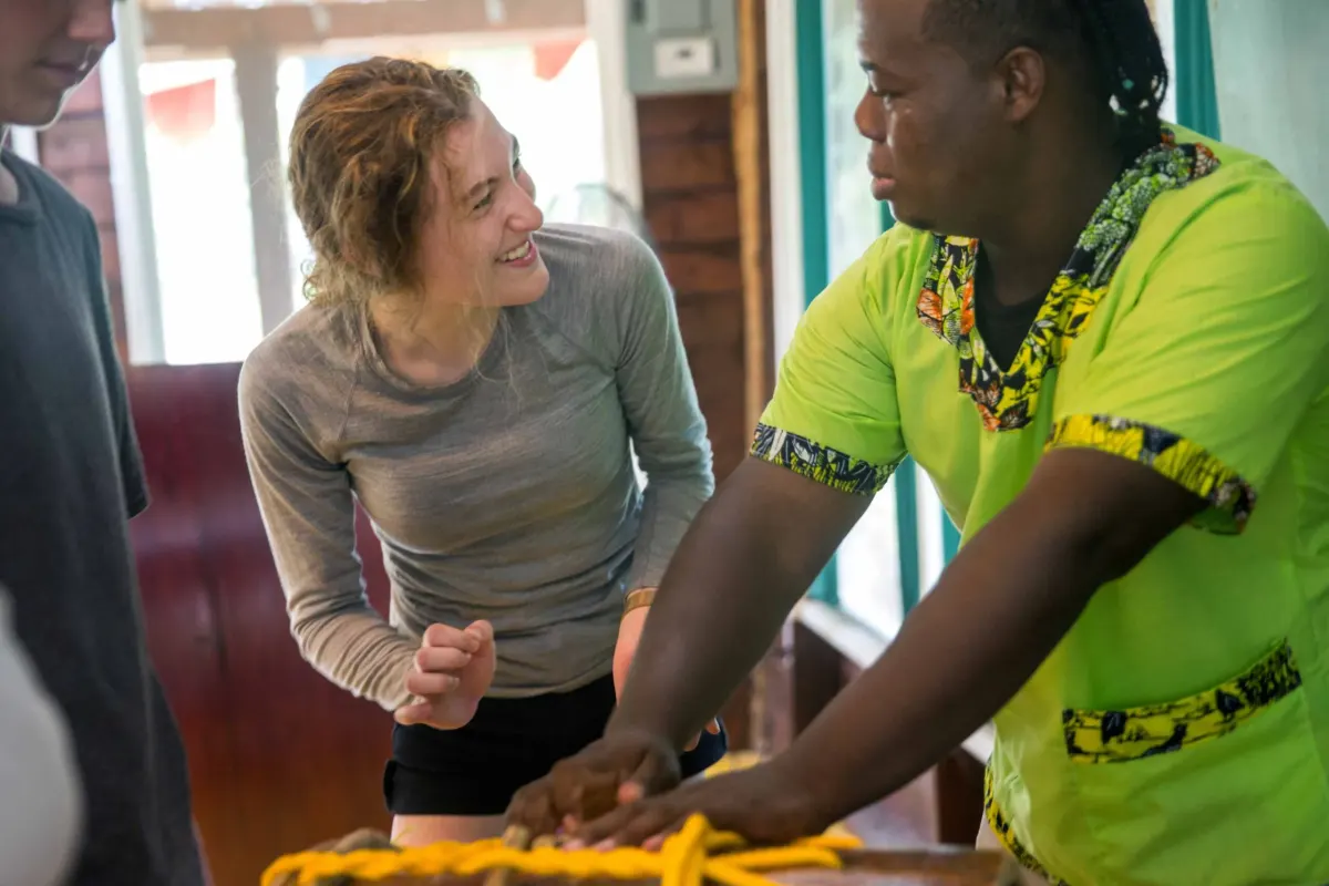 Students learn drumming from locals