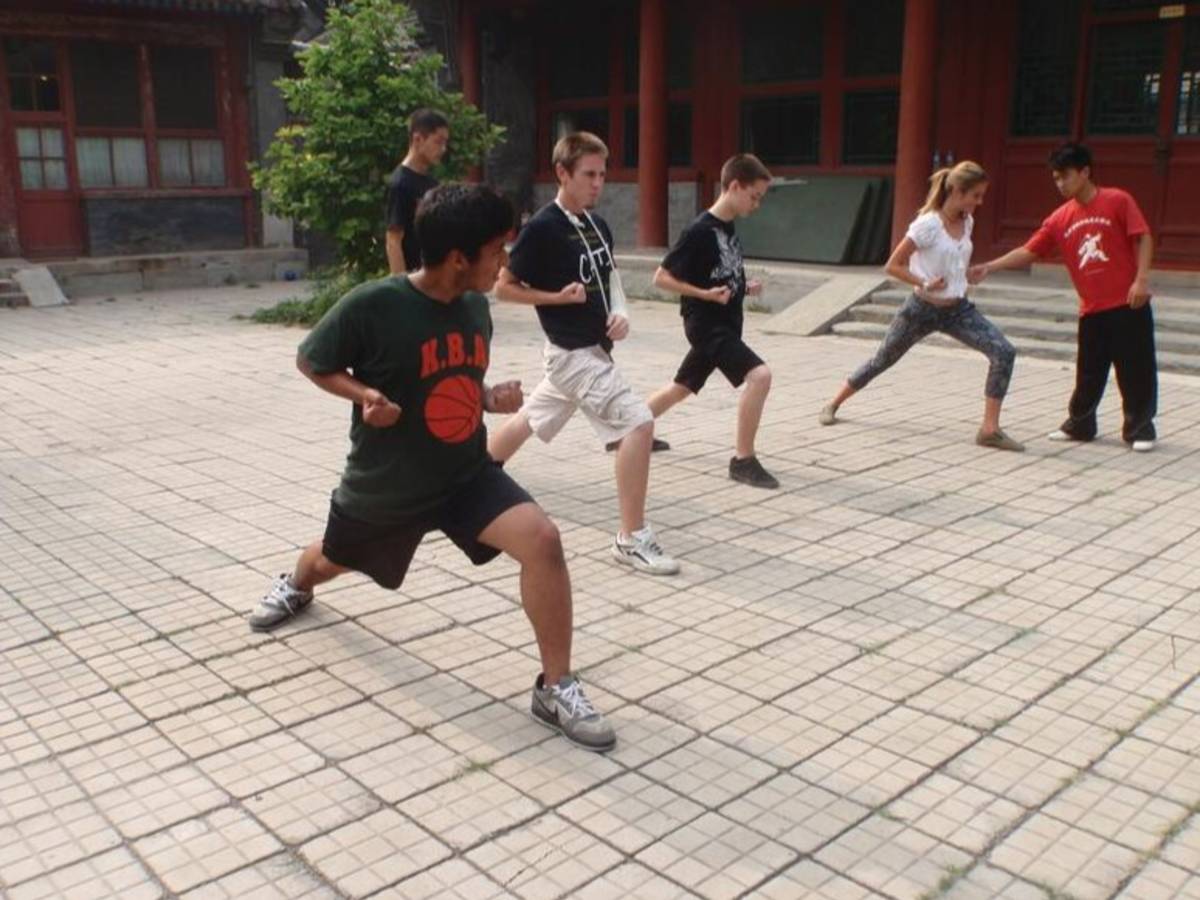 Students learning martial arts on program