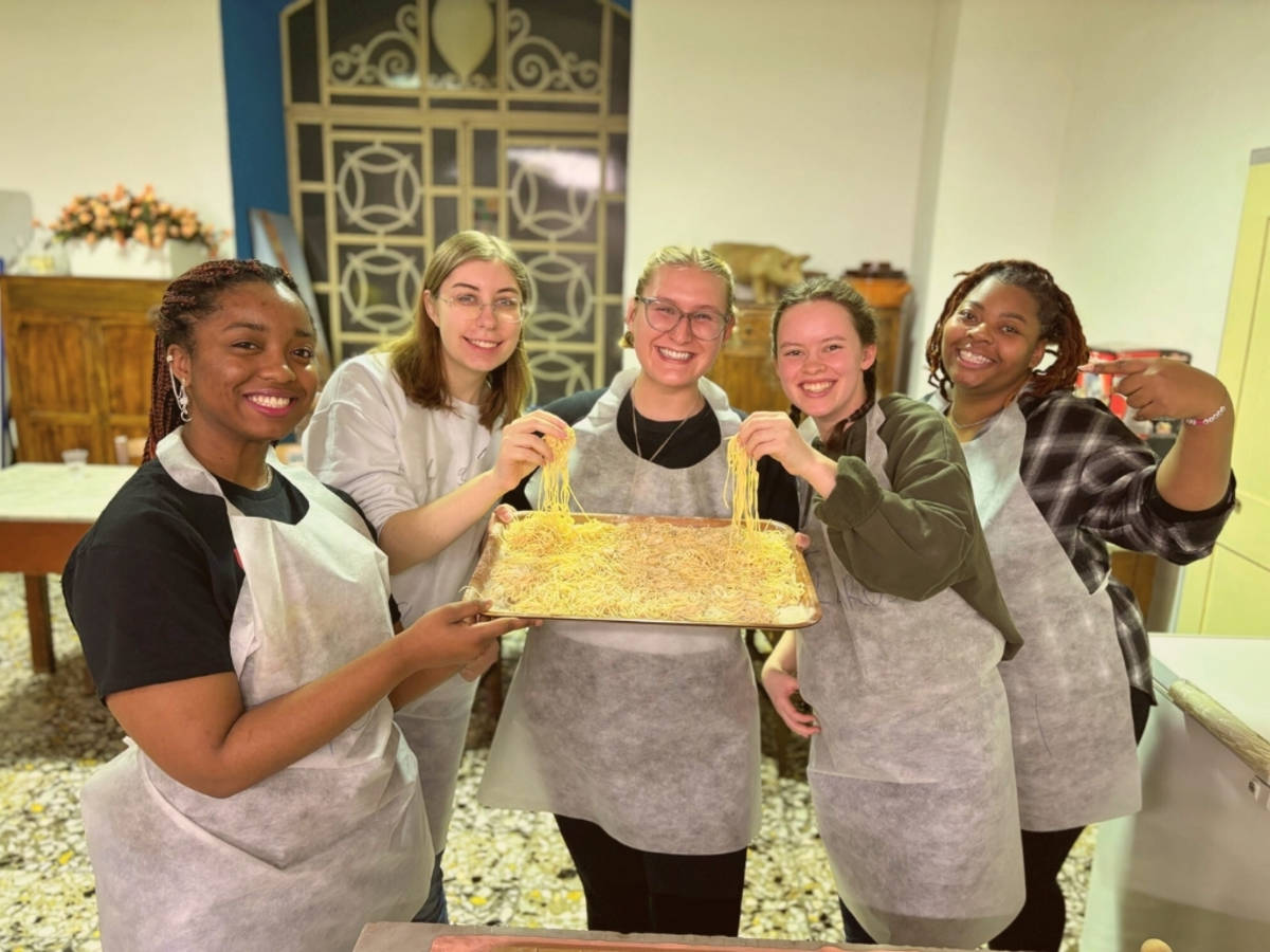 students making pasta