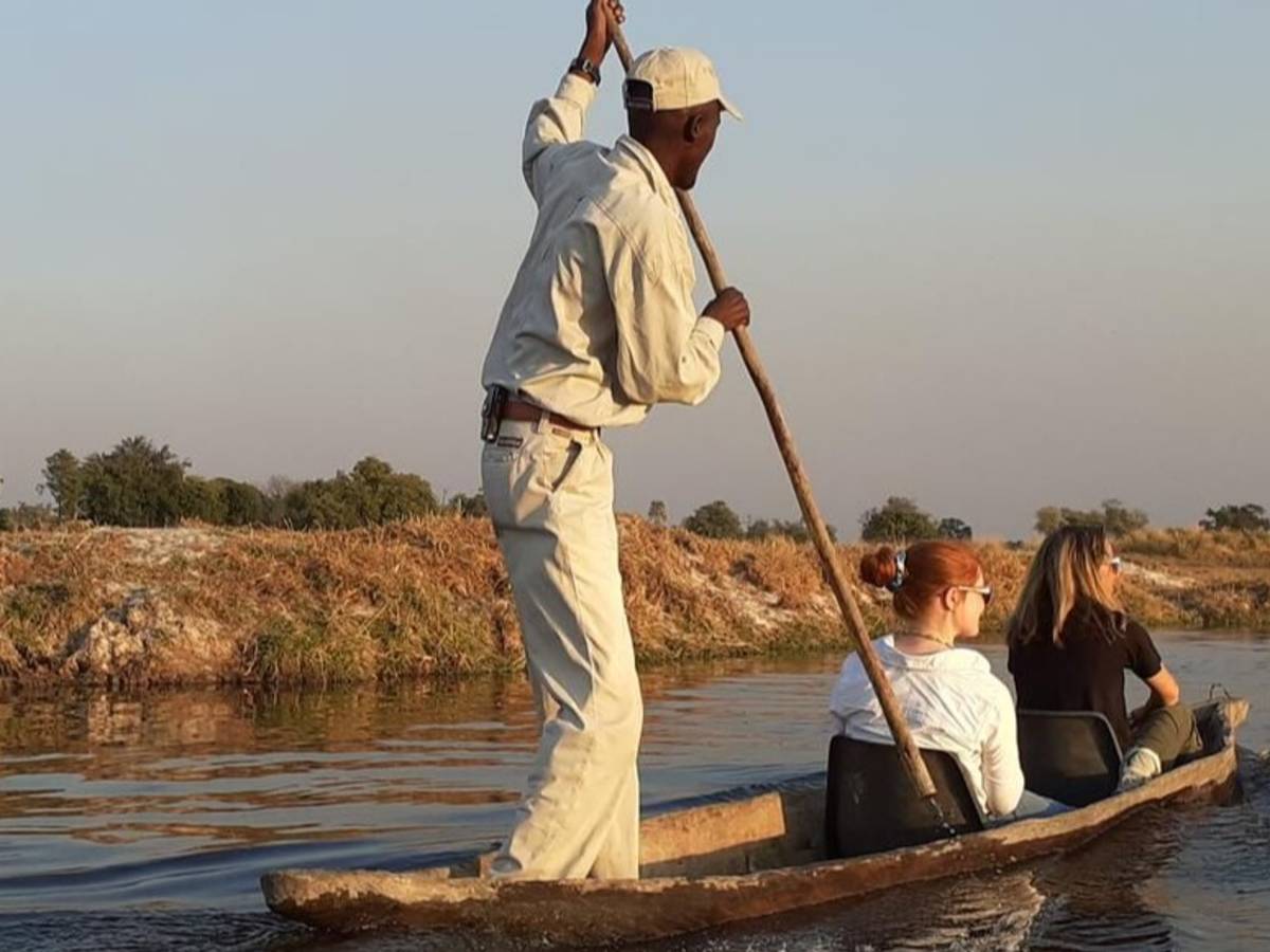 Students on boat ride with local in Gaborone