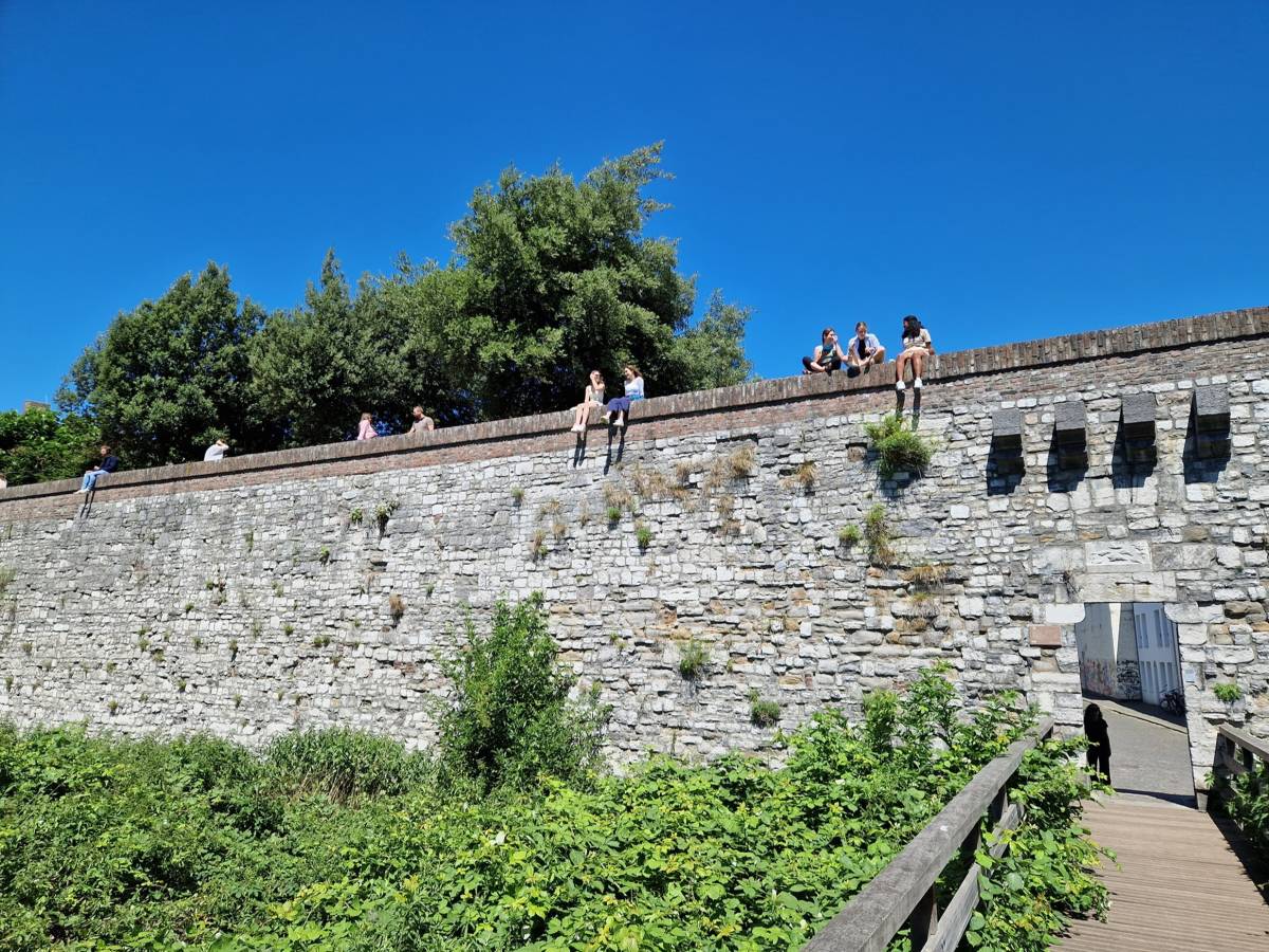 Students on the old city wall in Maastricht