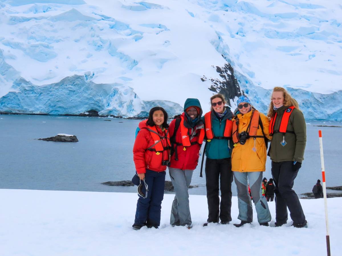 Students pose on glacier